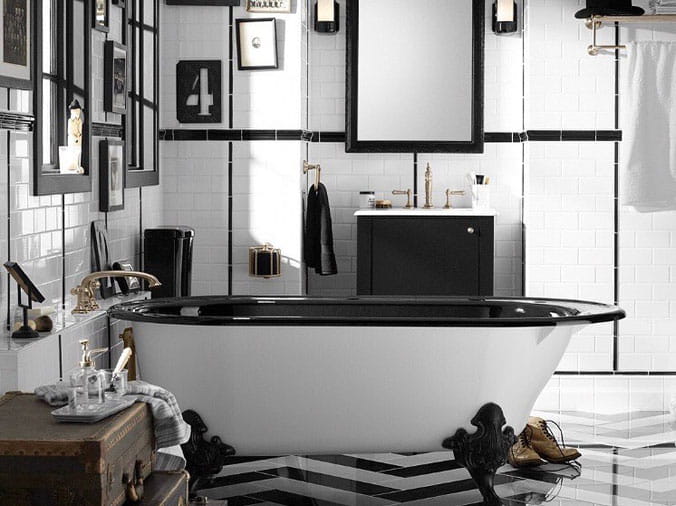 Free standing bathtub with white exterior and black interior